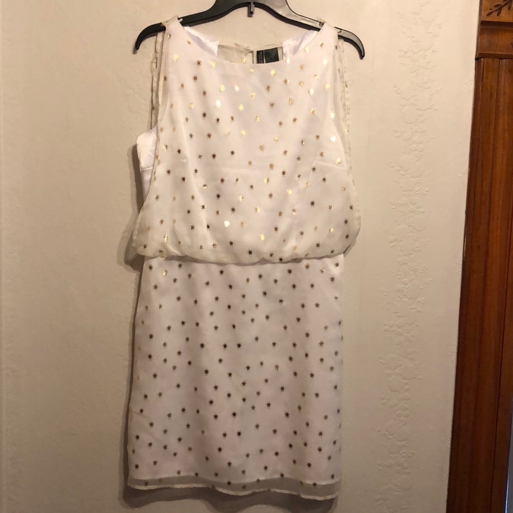 White dress with gold stars